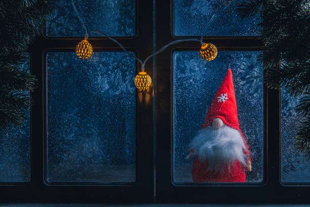 Christmas card with wife of Santa Claus and blurred Christmas lights in background