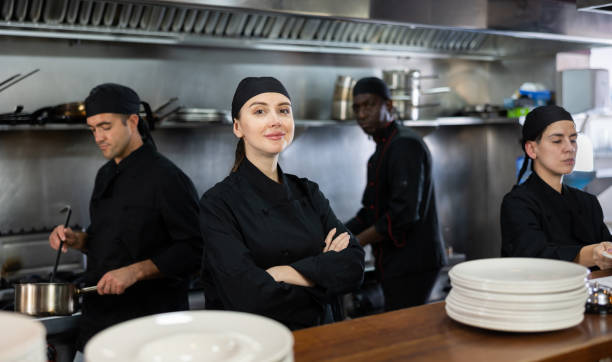 istock Woman executive chef posing in restaurant kitchen 1443064415