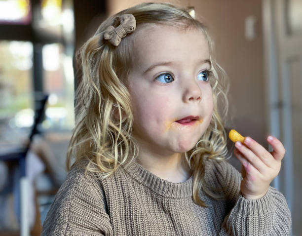 istock Chips eating Toddler girl 1443066088