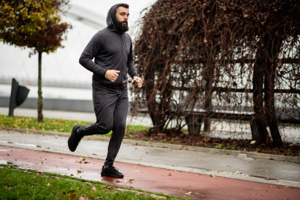 istock Young man running outdoors 1443066093