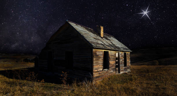istock Christmas star in the sky over a house 1443067023