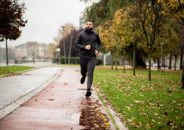 istock Jogging on a cold rainy morning 1443069418
