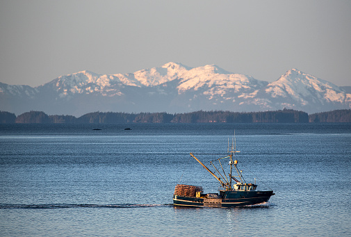 The fishing vessel Alaskan Girl motors north past Mountain Point on March 19, 2020.