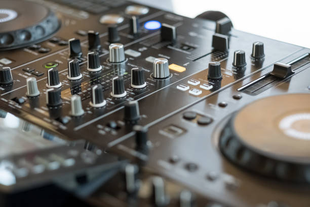 istock Dj mixer at a party playing rock pop regueton music 1443076353