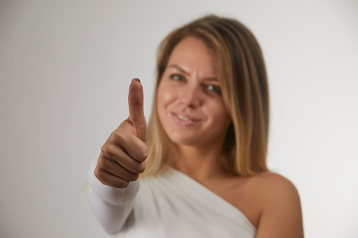 Young and beautiful Ukrainian woman posing positive