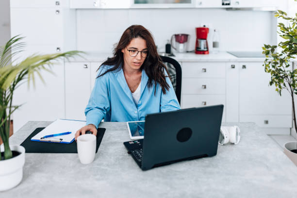 istock Young woman working from home 1443081225