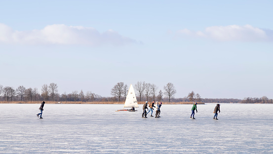 Breukeleveen, The Netherlands, February 12, 2021; Skating and ice sailing on the Dutch Loosdrecht lakes.