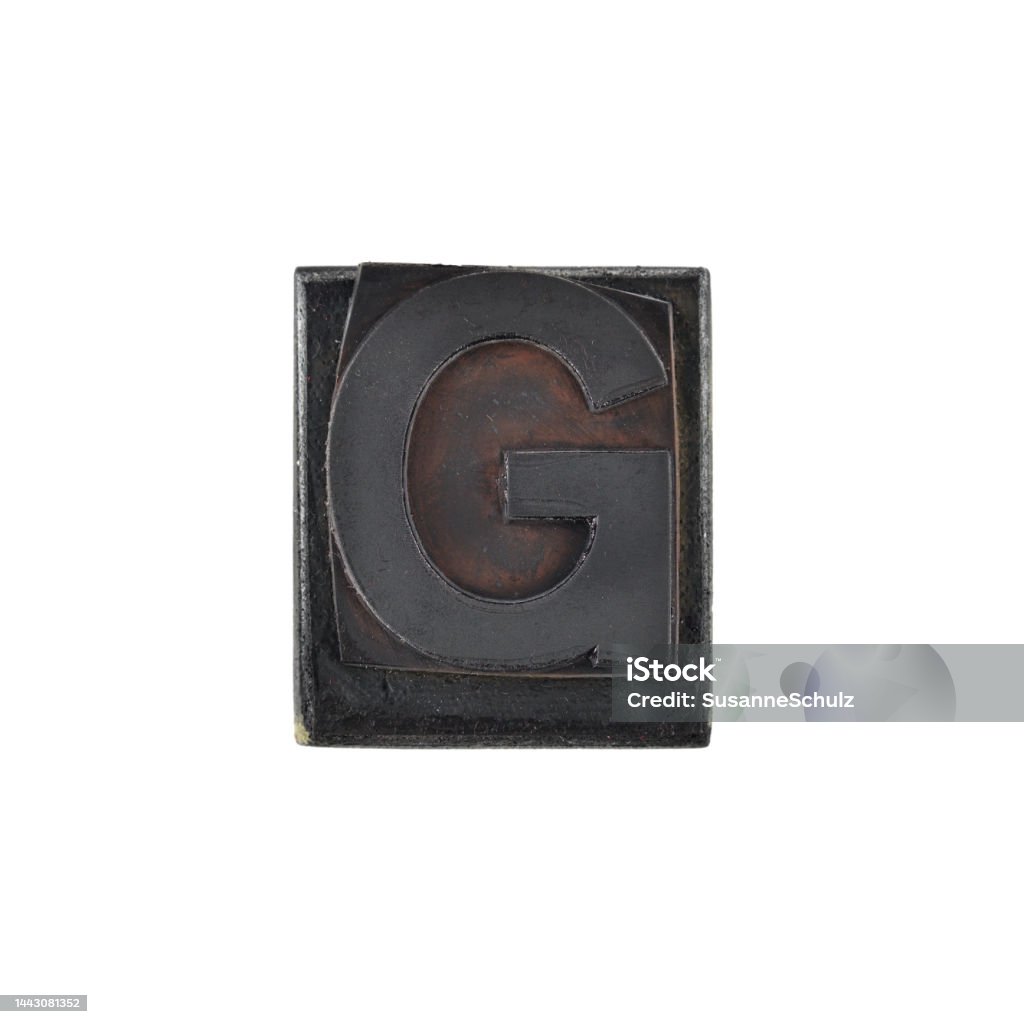 Capital letter on retro rubber stamp with white background, alphabet - G High quality photograph of letter stamps. Nice retro used style in flat lay on white background. Check out more letters: Alphabet Stock Photo