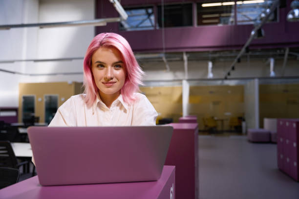 istock Lady sitting in coworking space and working online 1443083716