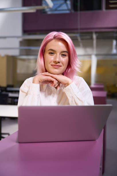 istock Designer sitting in coworking space and working online 1443083723