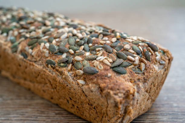 istock whole grain bread on a wooden table 1443084980