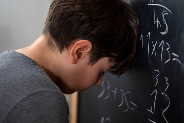istock student kid writing to the blackboard at school 1443087653