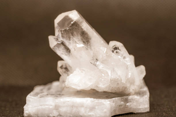 Quartz with mineral crystals photographed in the studio against a black background