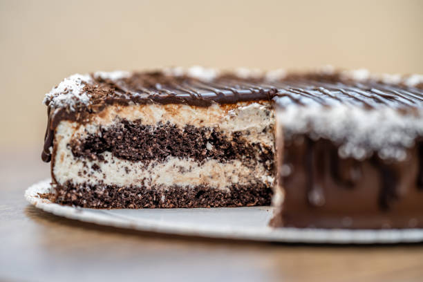 istock chocolate cake with cream and frosting 1443088813