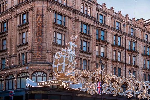 London, United Kingdom - November 20, 2022: Christian Dior Christmas decorations on Harrods department store in Knightsbridge