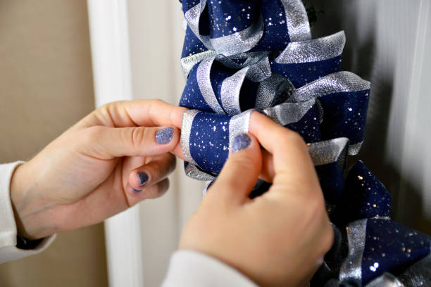 istock Female Hands Preparing Craft Wreath 1443098508
