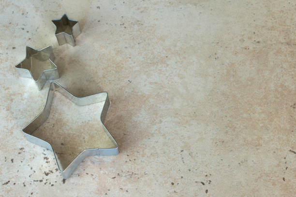 Vintage Tin Star Shaped Cookie Cutters stock photo