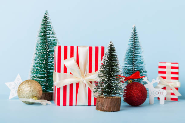 istock Christmas composition. craft Gift box, small tree, branches and craft DIY decorations on white background. New year concept. Christmas home decoration Flat lay, top view, copy space 1443102662