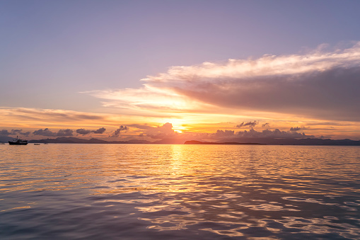 Sunrise over the sea and beautiful cloudscape