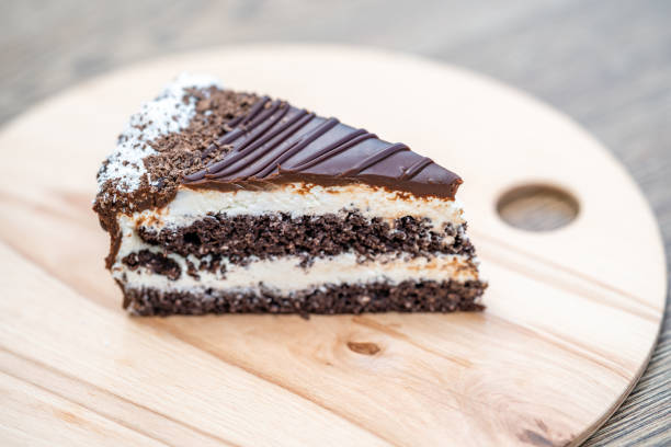 istock chocolate cake with cream and frosting 1443104842