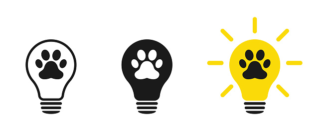 Animal paw icon on light bulb icons set. Illustration