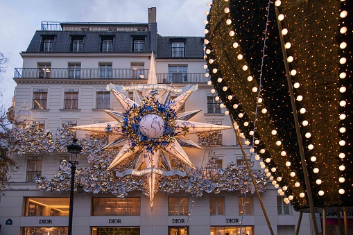 Paris, France - November 19, 2022: Christmas decorations on Christian Dior store