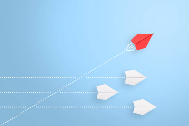 istock Change concepts with red paper airplane leading among white 1443110092