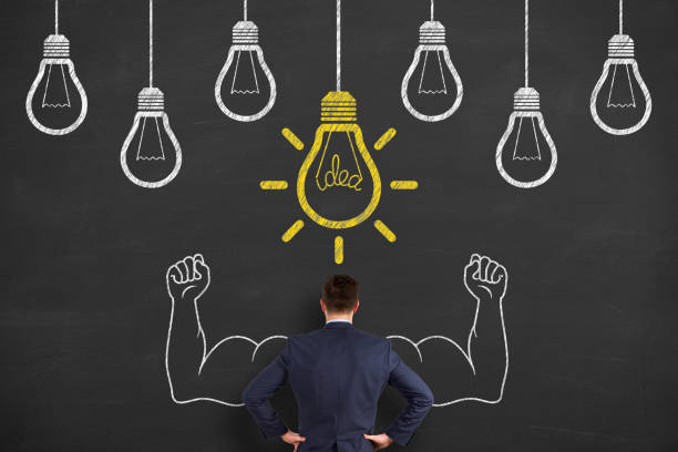 istock Thinking human with idea bulb in bubble on chalkboard background 1443110140