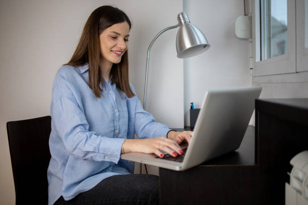 istock Young woman working from home 1443110533