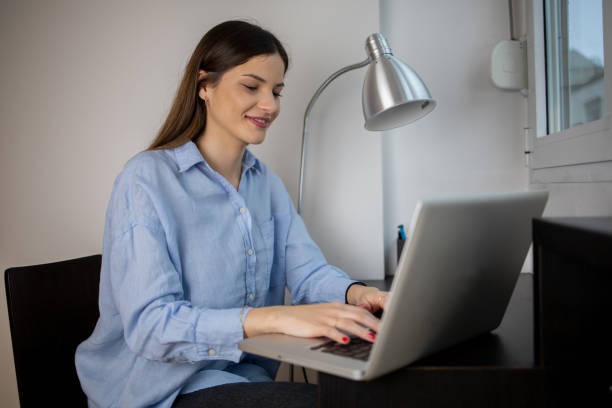 istock Young woman working from home 1443110552