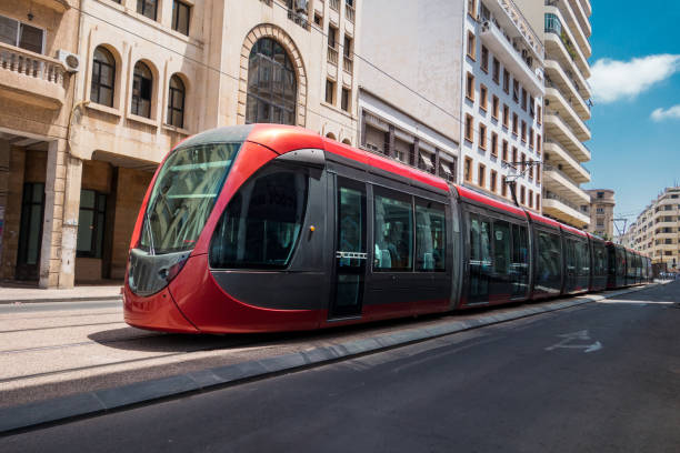 istock a tram passing on railways between old buildings 1443114064