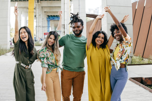 istock Dancing young group of friends 1443114122