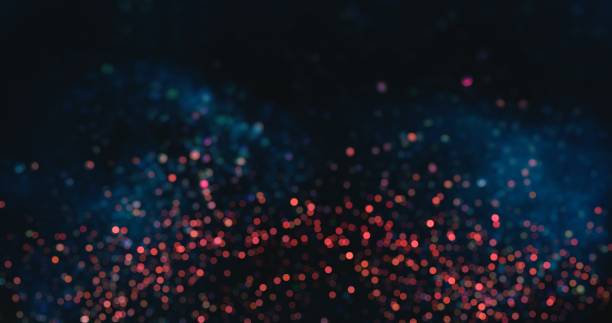 istock bokeh sparks particles background blue red circles 1443114141