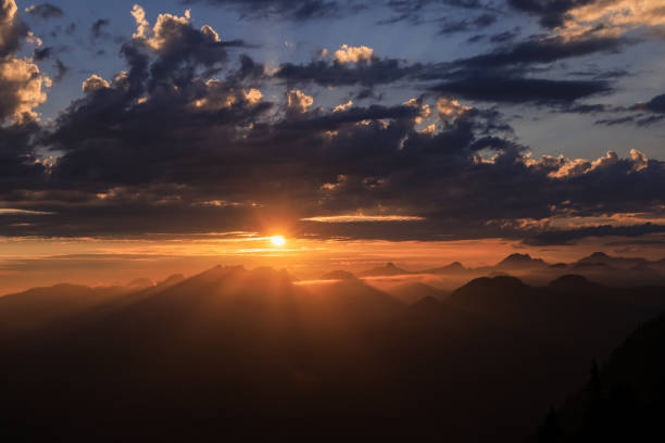 istock Colorful sunset with mountain silhouettes, beutiful clouds in the sky, Vancouver, British Columbia, Canada. 1443118607