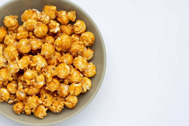 istock Honey caramel popcorn on white background. 1443119932