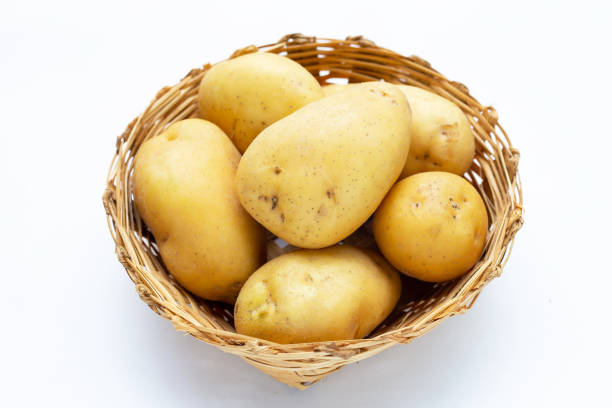 istock Raw potatoes isolated on white background 1443123273