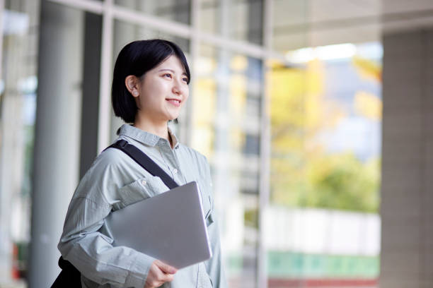 istock Young Japanese college student enjoying campus life 1443126230