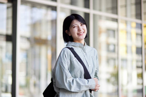 istock Young Japanese college student enjoying campus life 1443126233