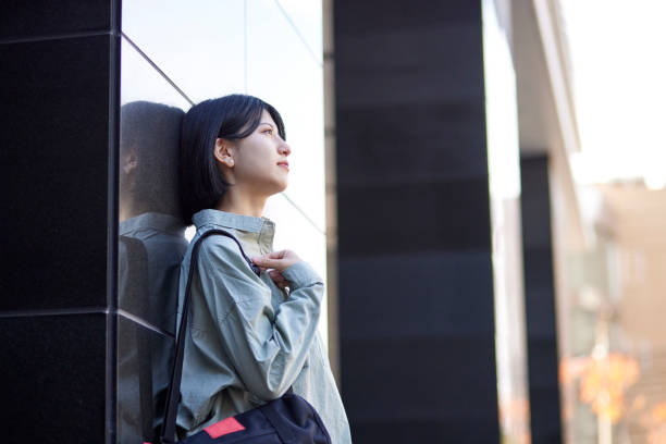 istock Young Japanese college student enjoying campus life 1443126244