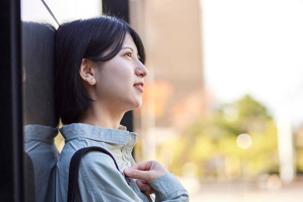 istock Young Japanese college student enjoying campus life 1443126248