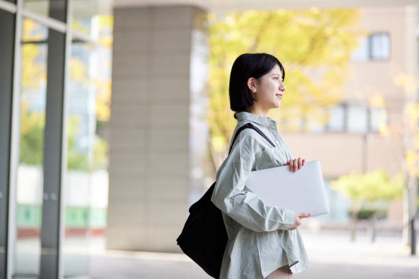 istock Young Japanese college student enjoying campus life 1443126454