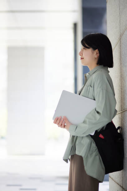 istock Young Japanese college student enjoying campus life 1443126474