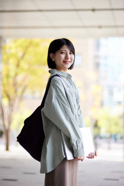istock Young Japanese college student enjoying campus life 1443126568