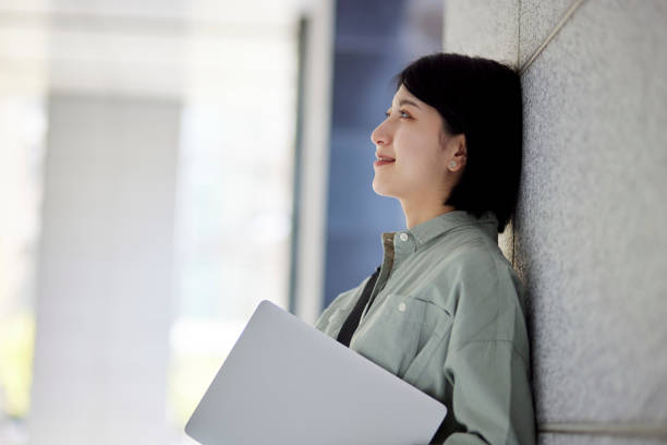istock Young Japanese college student enjoying campus life 1443126678