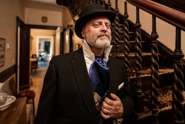 istock Mature man getting dressed for Christmas carolling 1443127601