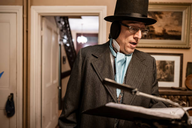 istock Mature man practising singing for Christmas carolling 1443128458