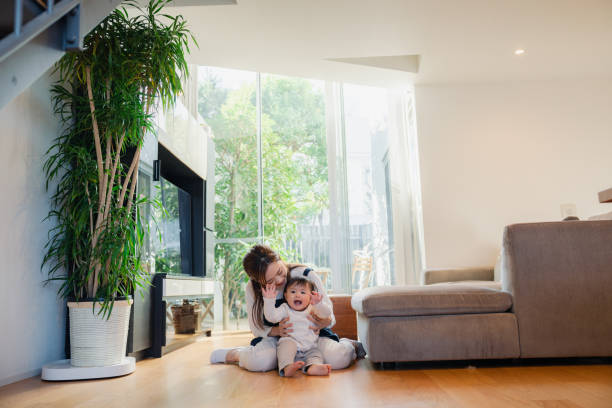 istock Babysitter taking care of baby 1443129769