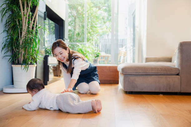 istock Babysitter taking care of baby 1443129771