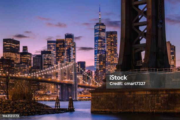 The Brooklyn Bridge Freedom Tower And Lower Manhattan At Night Stock ...