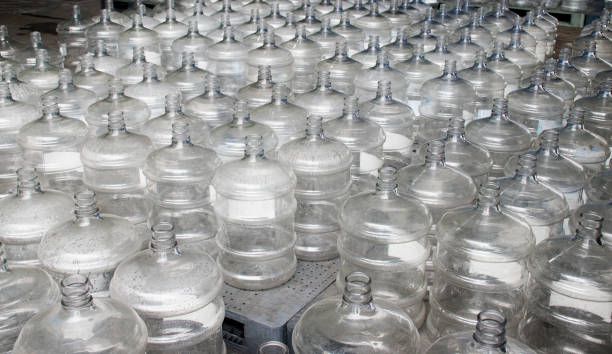 istock Pattern of 19 liter gallon plastic water bottle 1443134833